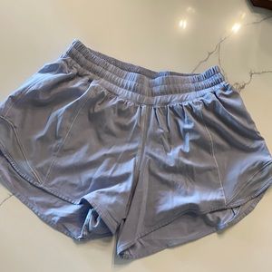 Lululemon Hotty Hot LR  short 4” lined. Has zippered side pocket, color Lilac